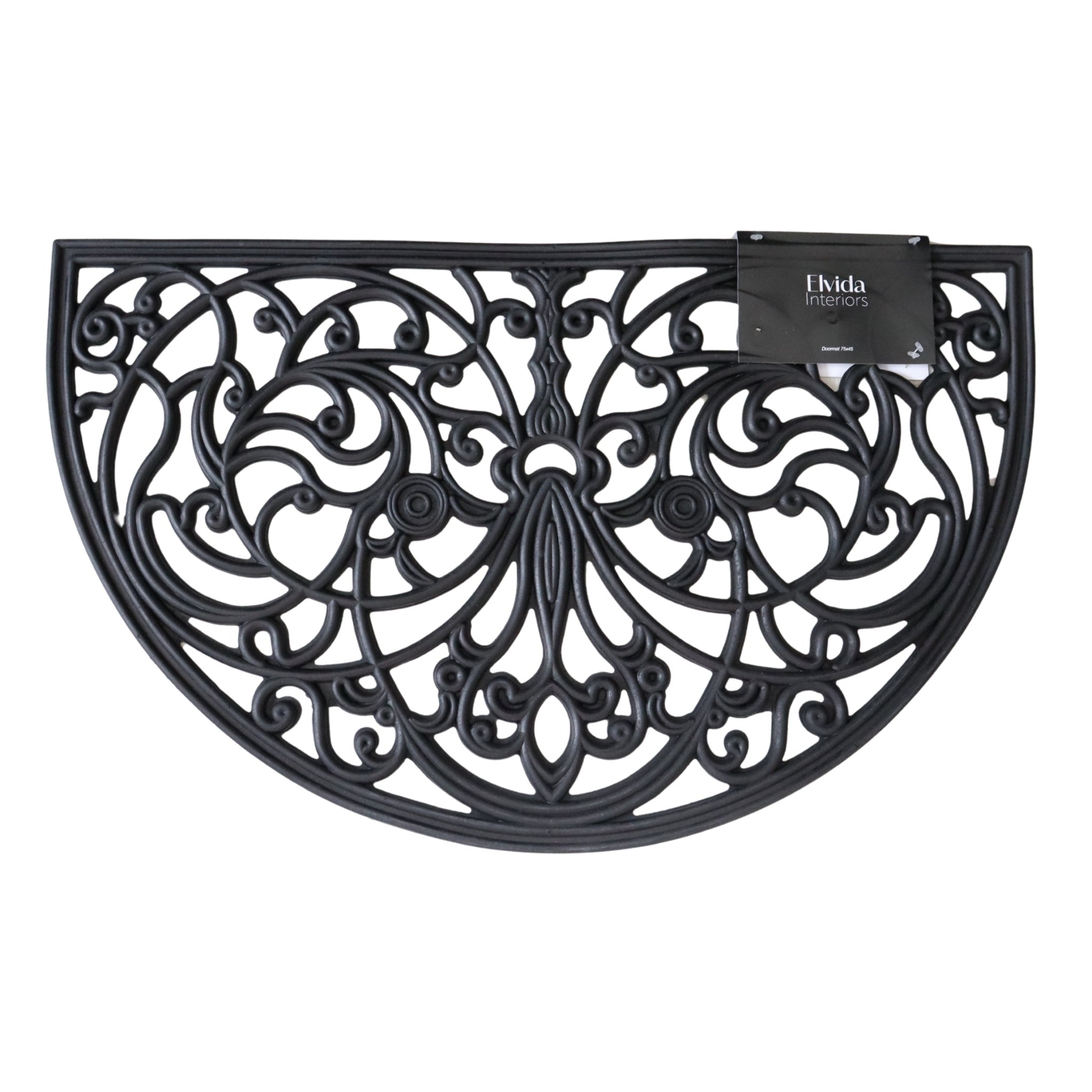 Decorative black rubber half-moon mat with intricate patterns on a white background