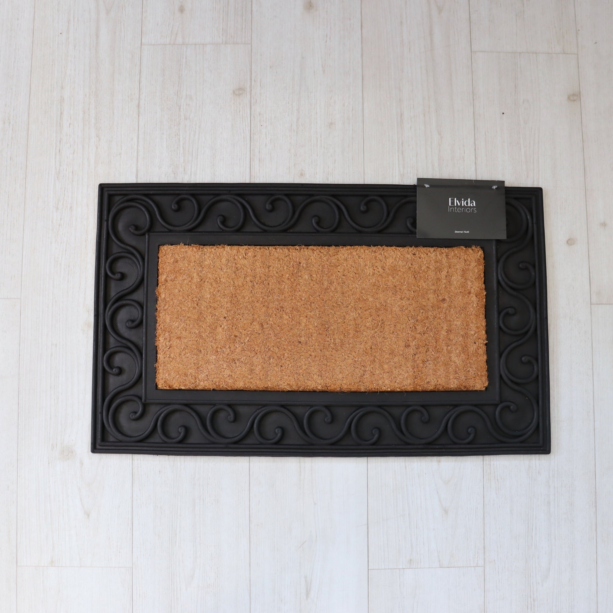 Coir doormat with black rubber decorative border