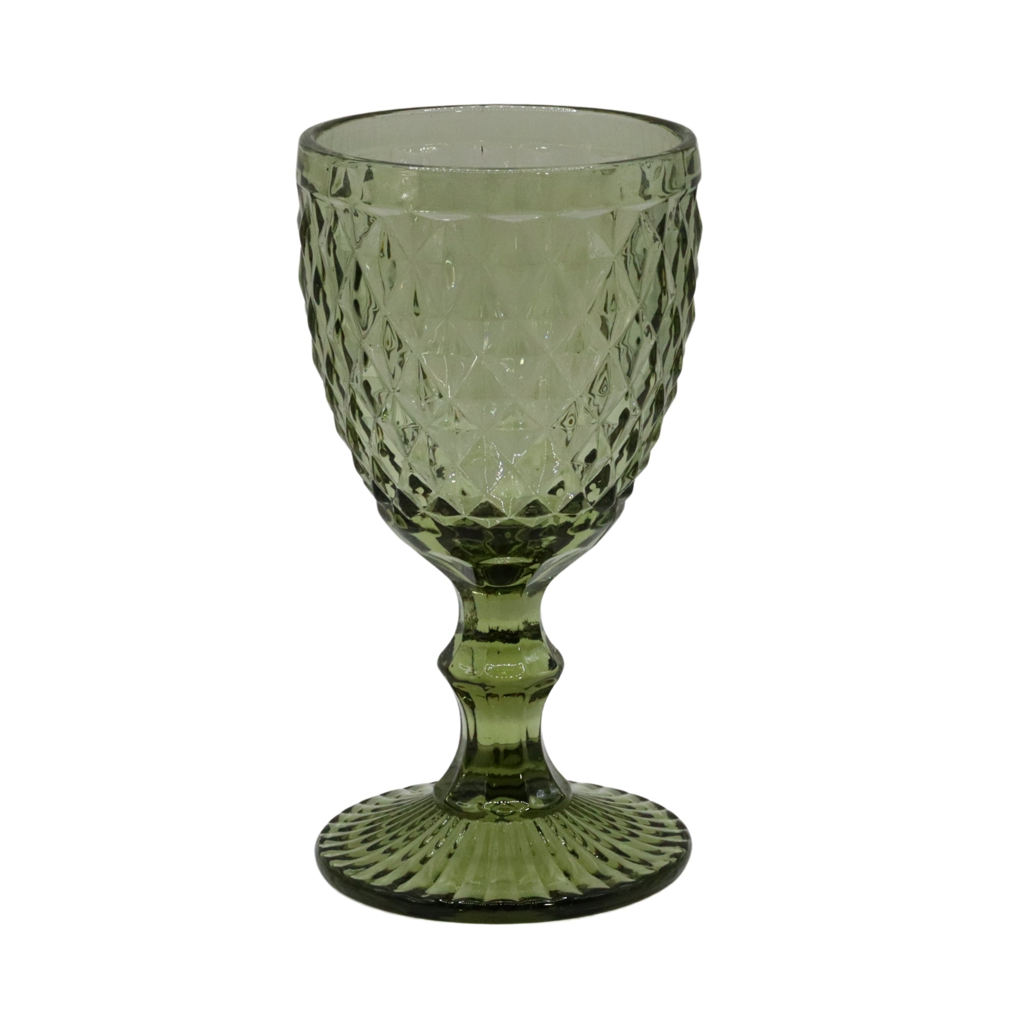 Green textured glass goblet on a white background