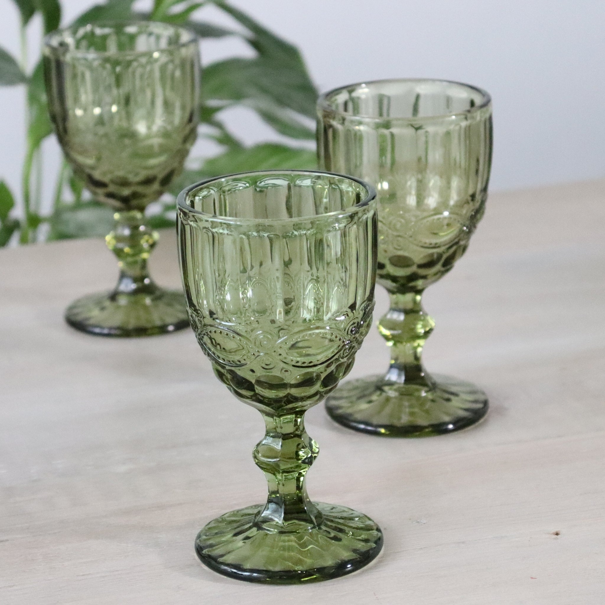 Decorative glass with textured design on a white background