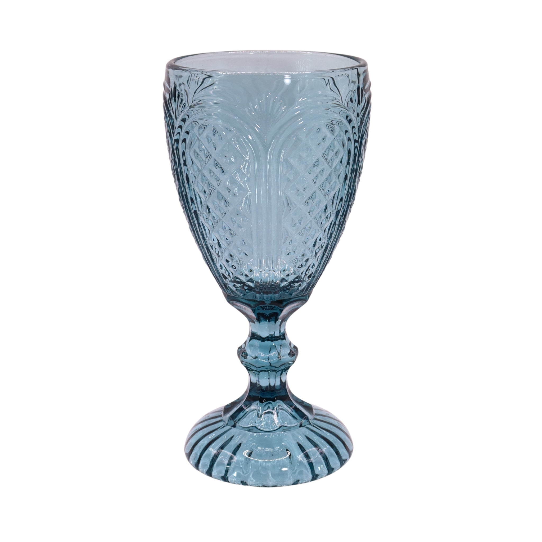 Blue glass goblet with intricate design on a white background