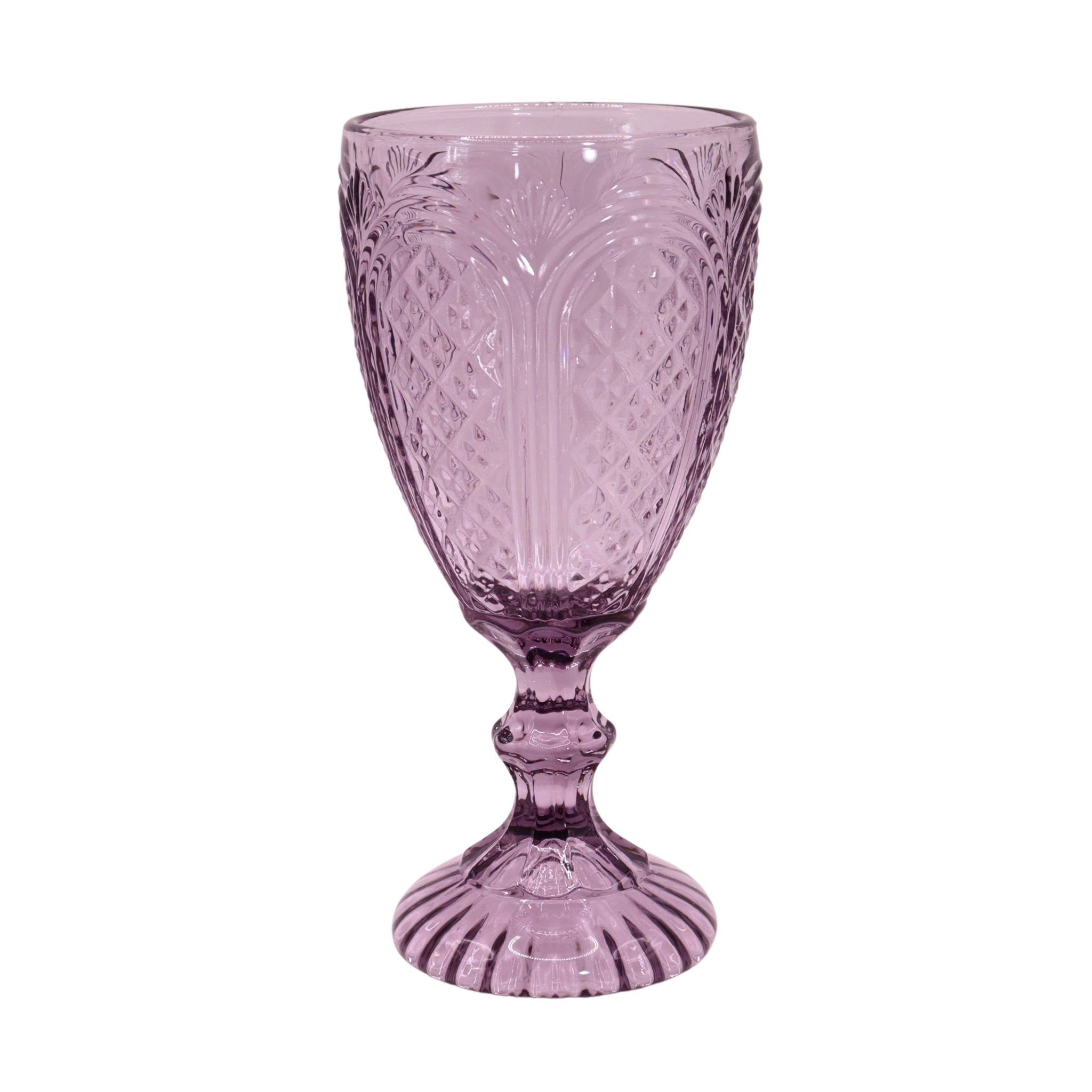 Purple glass goblet with decorative patterns on a white background