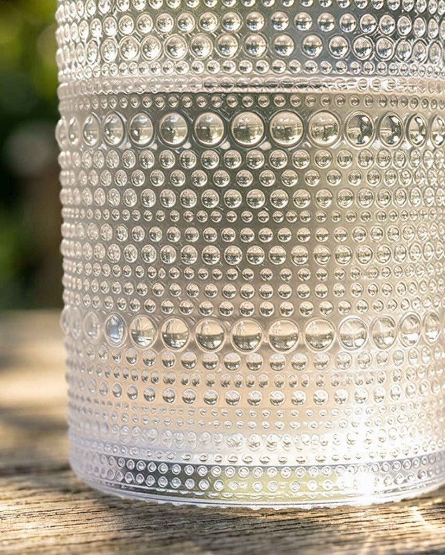 textured glass tumblers on a wooden block