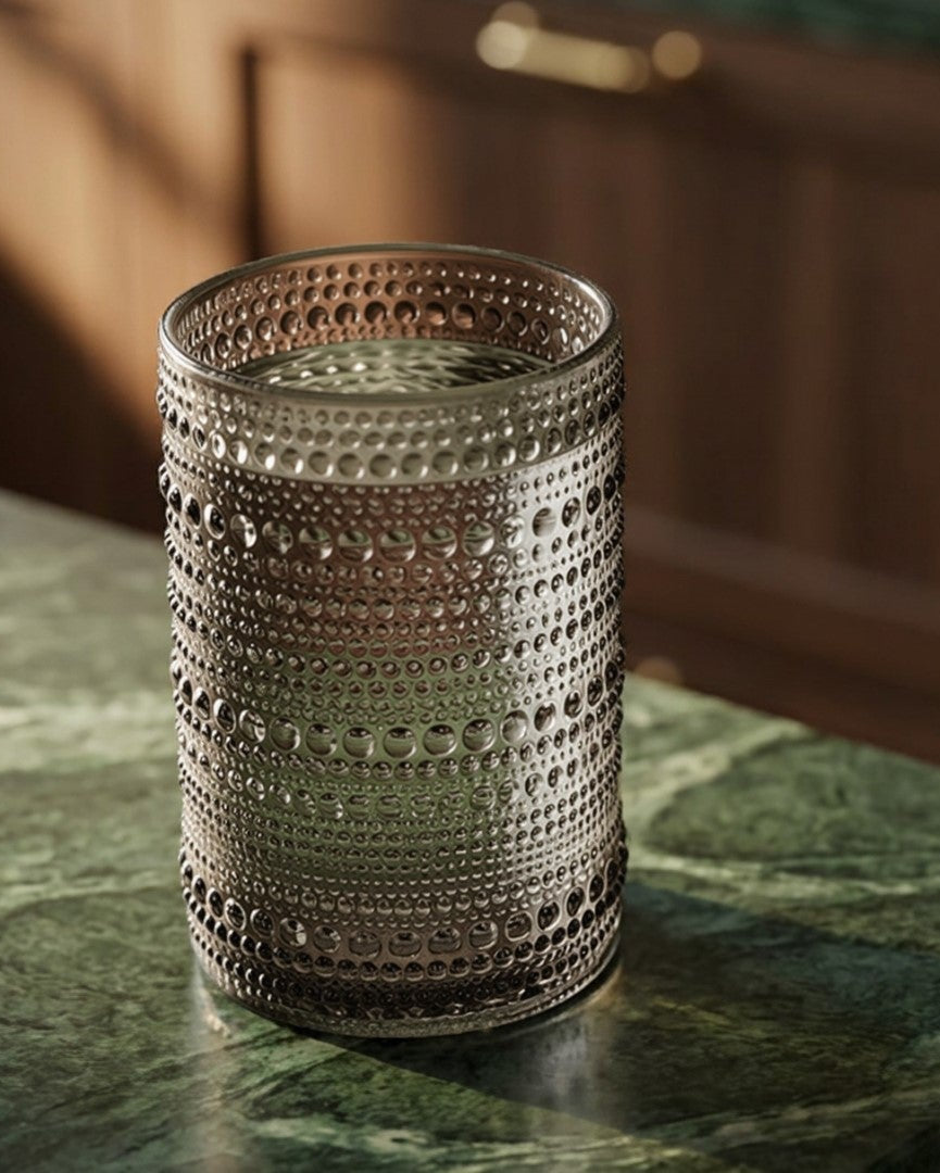 Grey glass tumblers in table setting