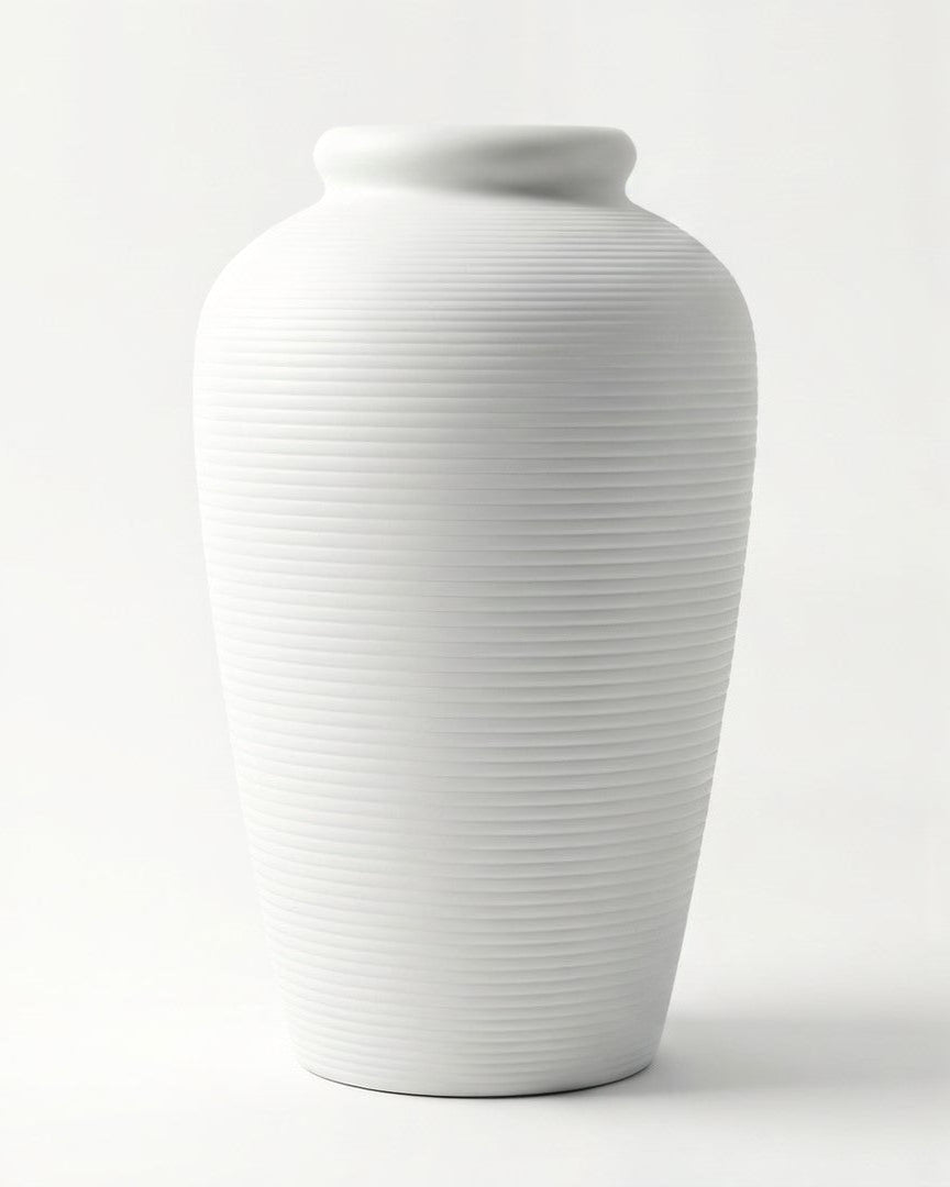 White ceramic vase on a white background