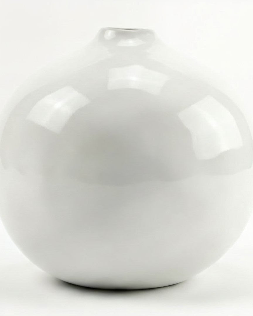 White ceramic vase on a white background