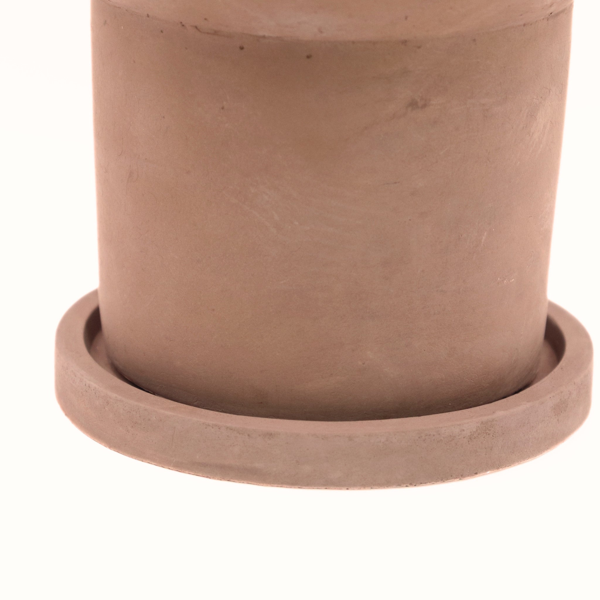 Close-up of a terracotta pot with a soft focus background
