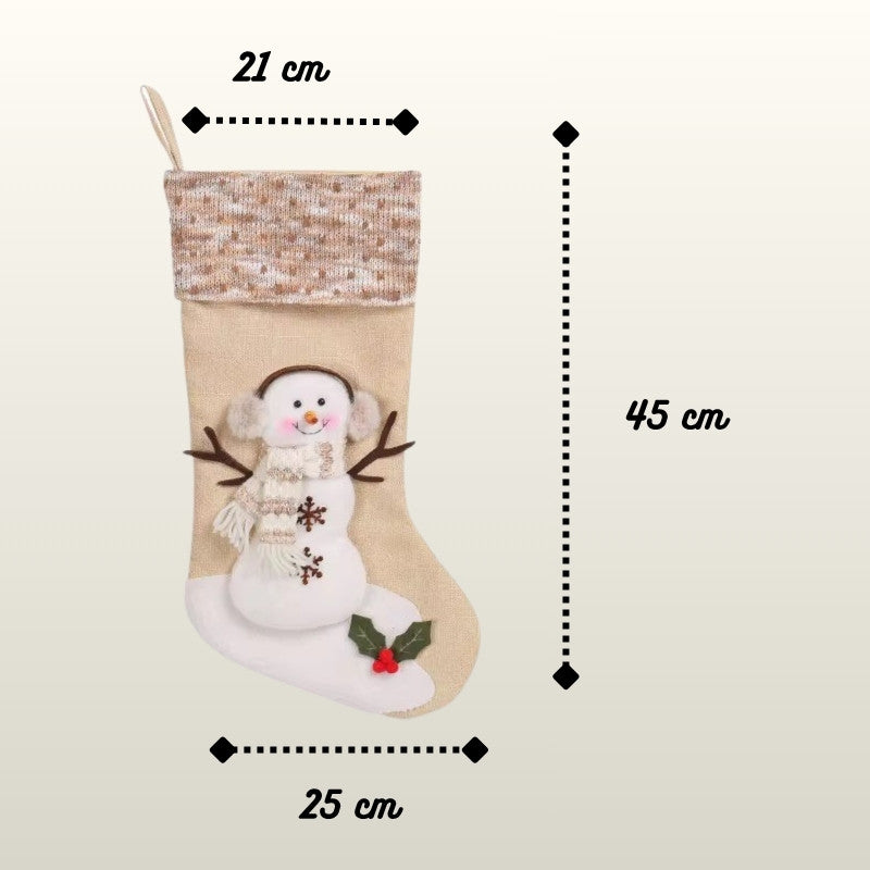 Beige Christmas stocking with snowman design and measurements on a beige background