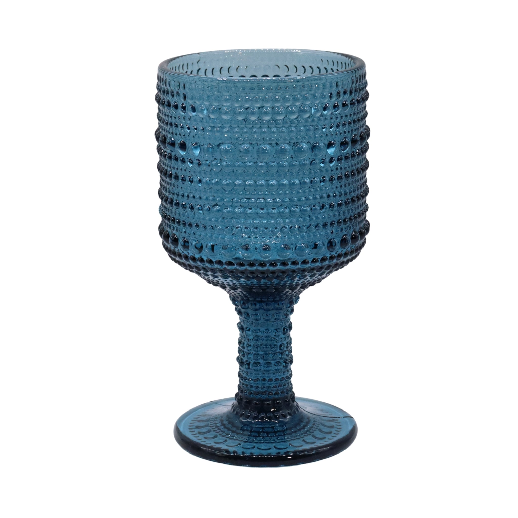 Blue textured glass goblet on a white background