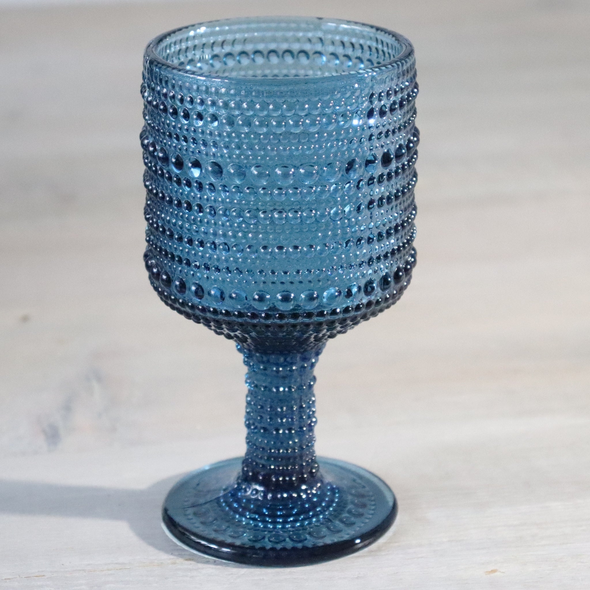 Blue textured glass goblet