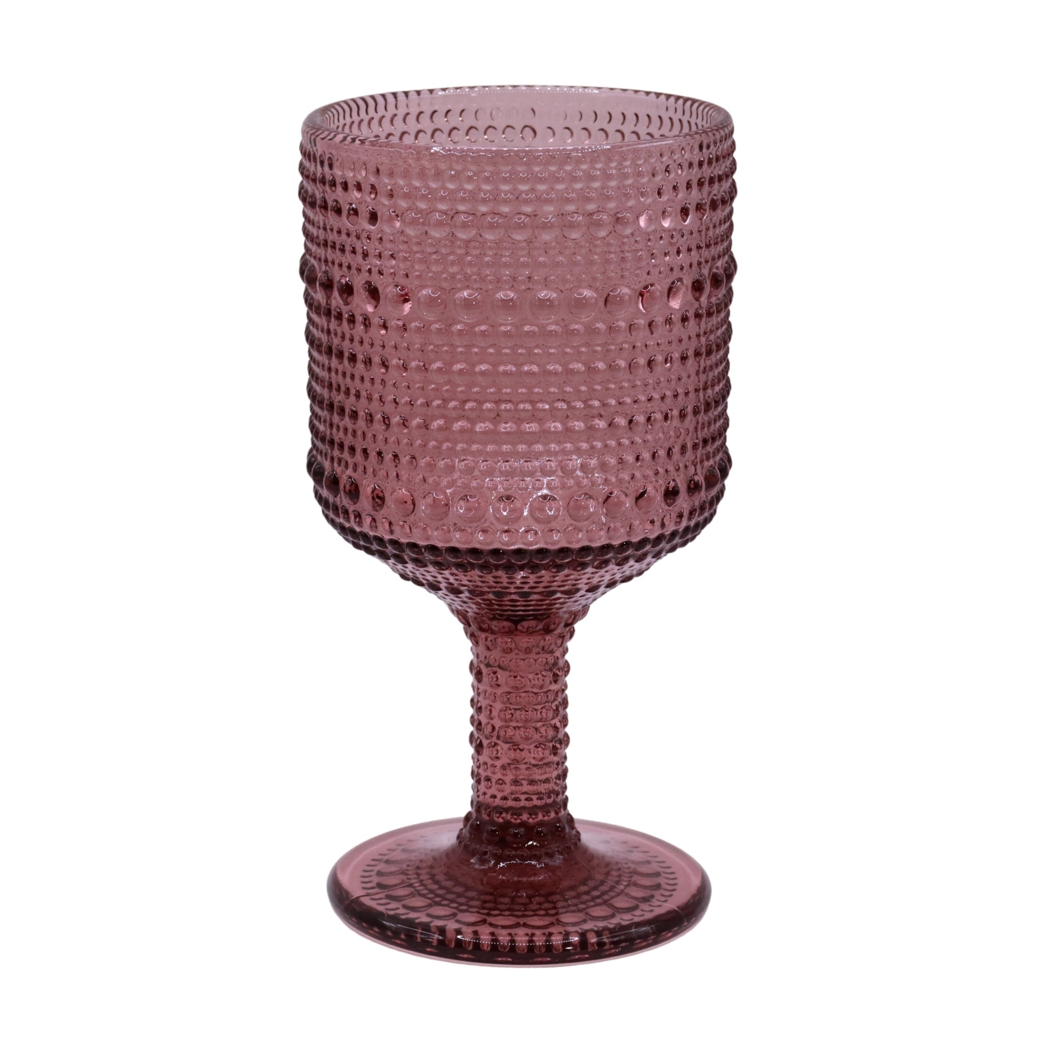 Pink textured glass goblet on a white background