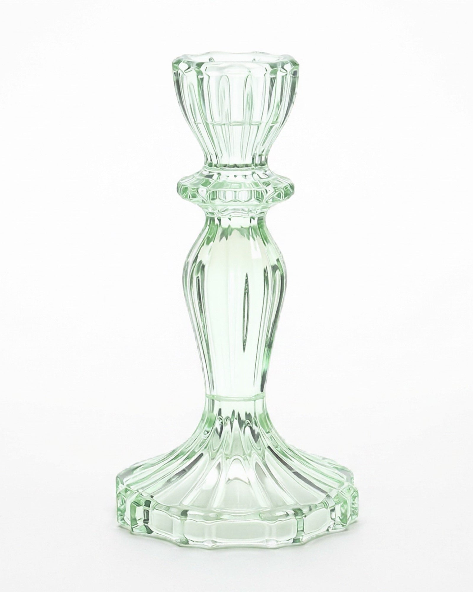 Clear glass candle holder on a white background