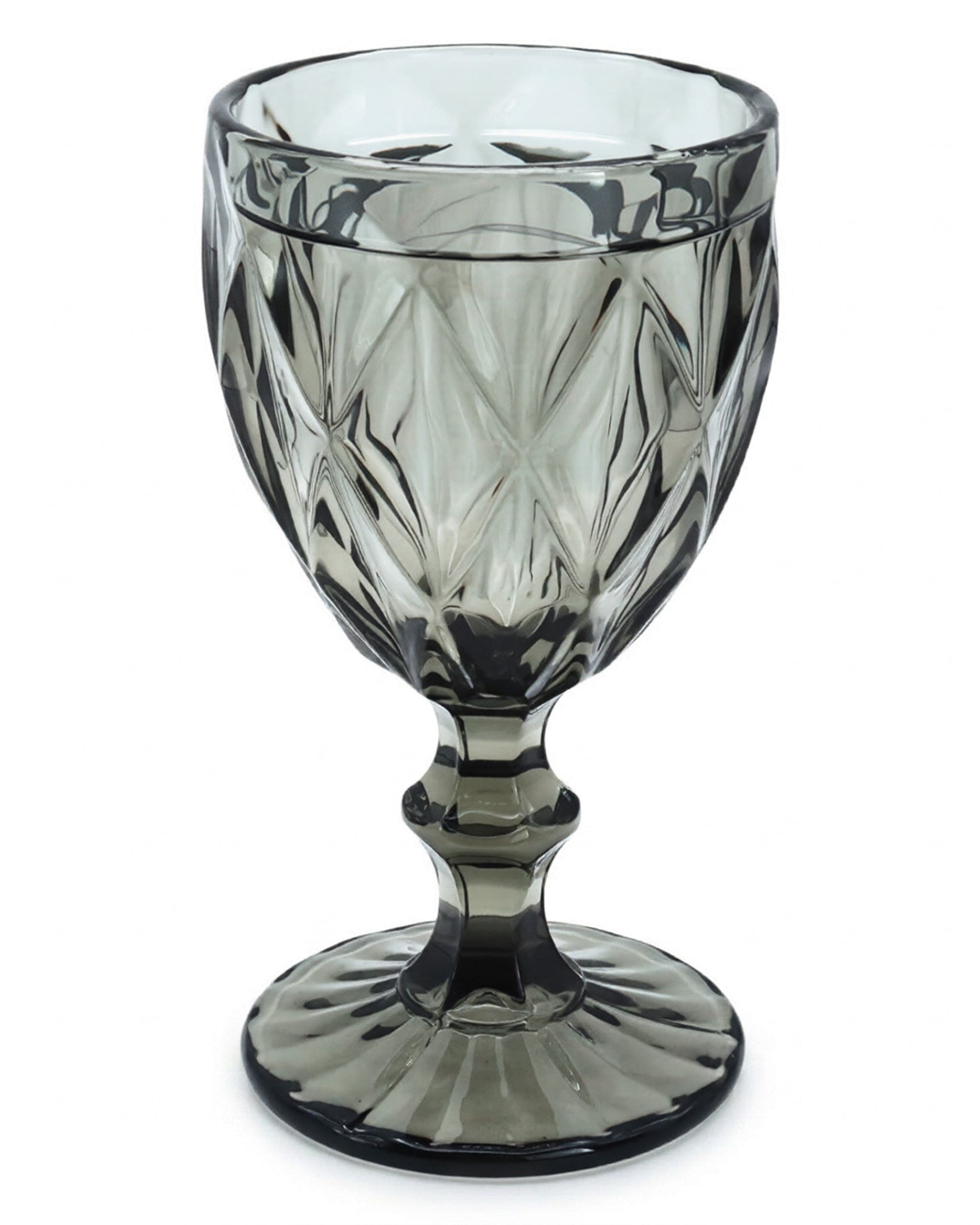 Smoky gray glass goblet with diamond pattern on a white background