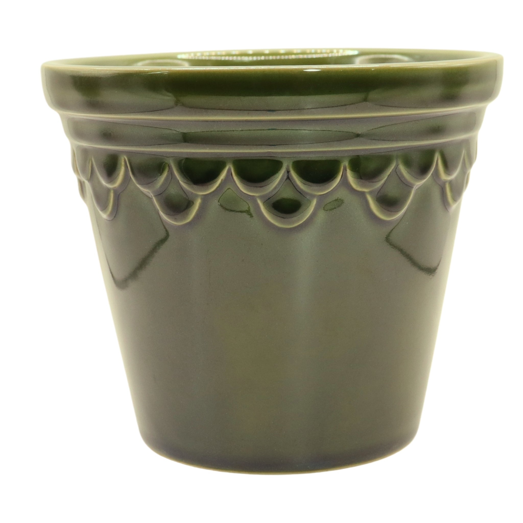 Green ceramic pot with decorative edge on a white background