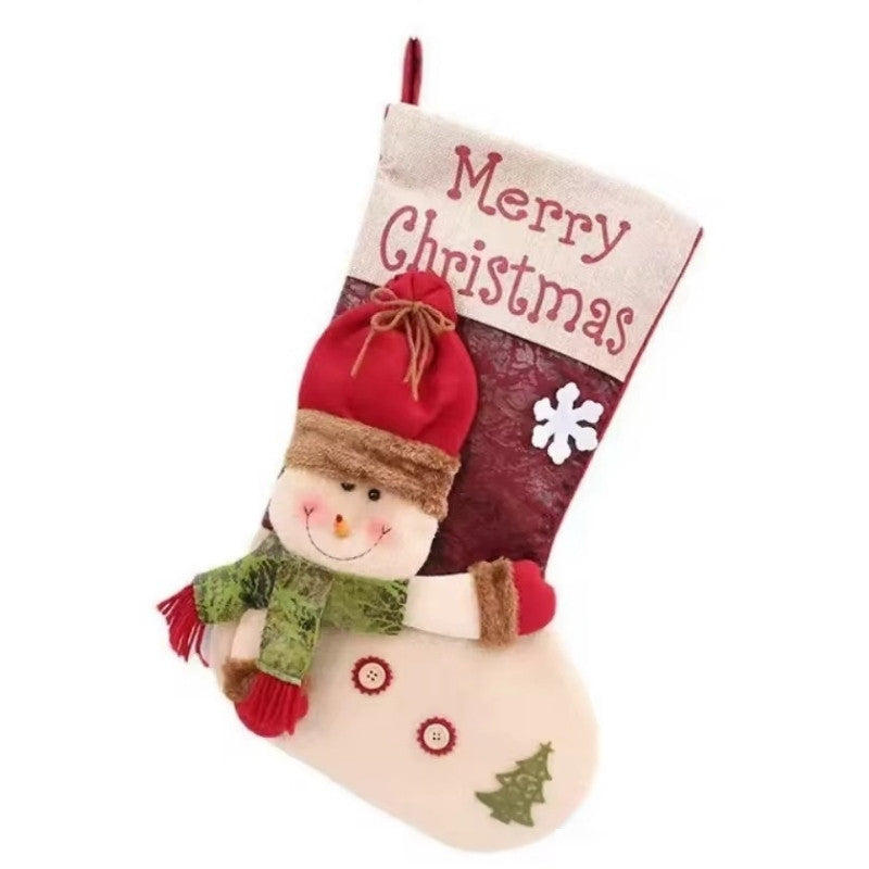 Christmas stocking with a snowman design and 'Merry Christmas' text on a white background