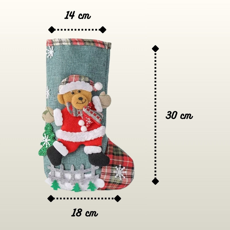Christmas stocking with teddy bear design and measurements on a beige background