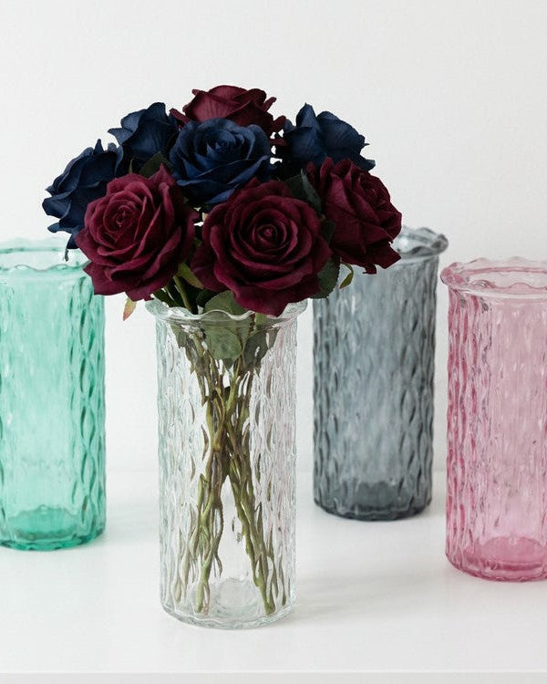 set of 4 glass vases in clear, grey, green and pink