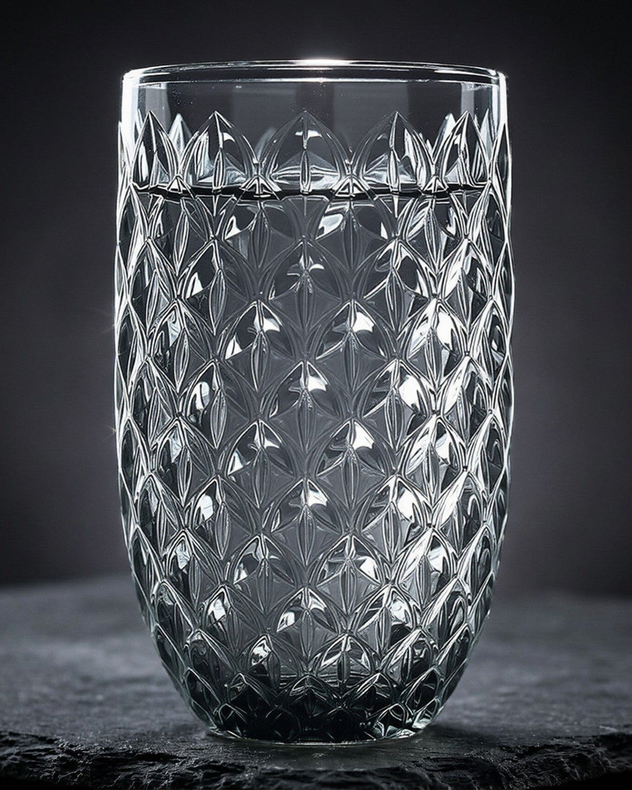 grey glass with diamond pattern and dark background